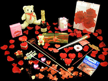 12 Valentines Day Roses, Bottle of Champagne and one unbelievable Valentines Day Treat