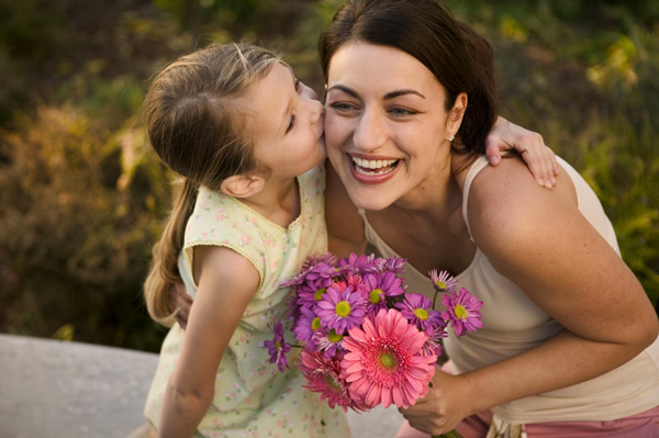 Mum and Daughter with flowers